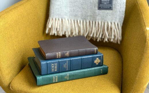 black and green books on yellow textile